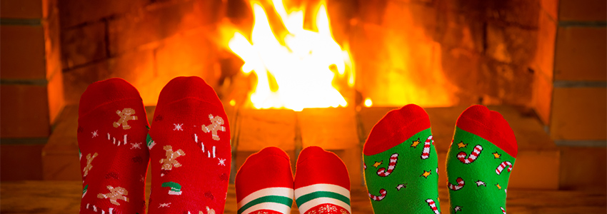 Christmas socks by natural gas fireplace